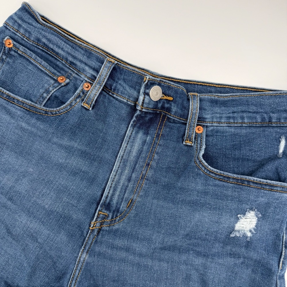 Levi's High Rise Shorts Women 30 Blue‎ Distressed Denim Raw Hem 72878-0015